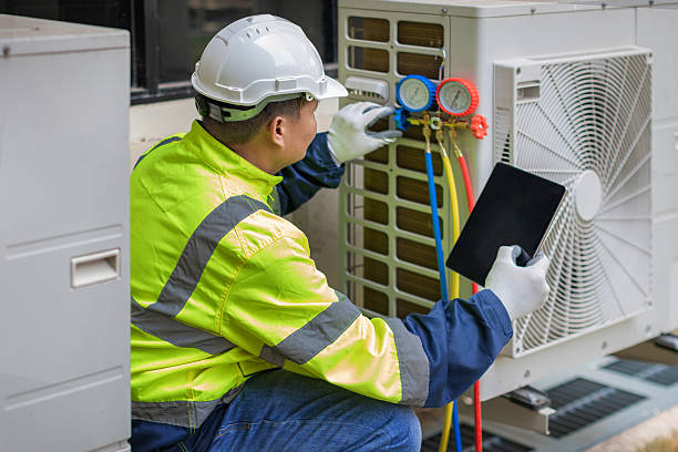 Professional Heat Pump Repair technician working in Fowler, IN